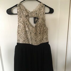 Beige and black dress